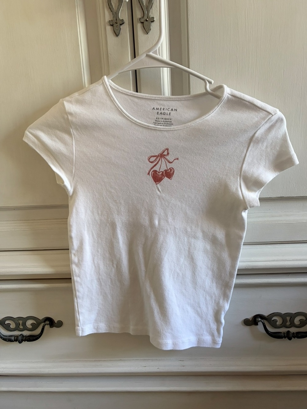 American Eagle Outfitters White Tee with Pink Heart Charm Graphic